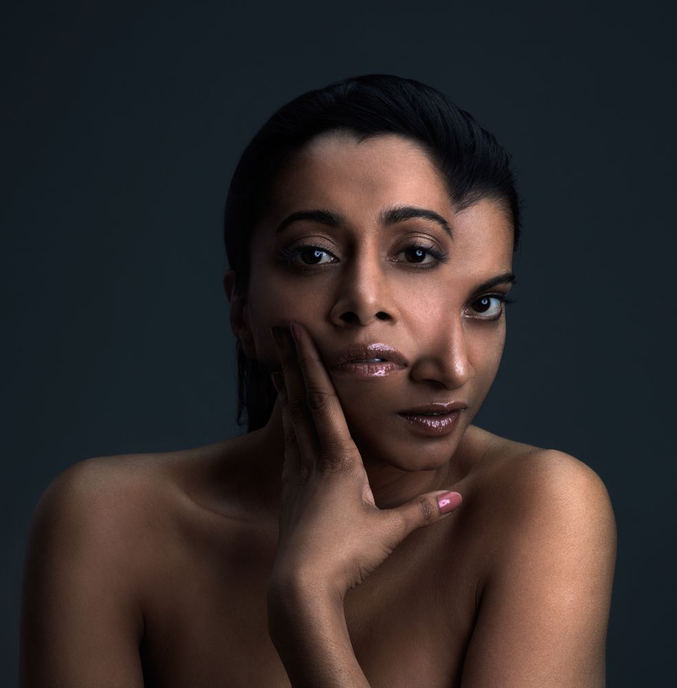 A surreal portrait of a woman with two overlapping faces, symbolizing emotional intensity, inner conflict, and shifting self-identity often experienced with Borderline Personality Disorder.
